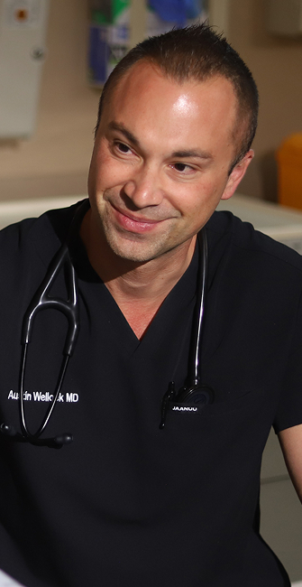 Kind doctor listening to a patient