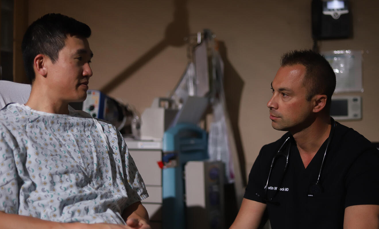 Doctor talking to patient