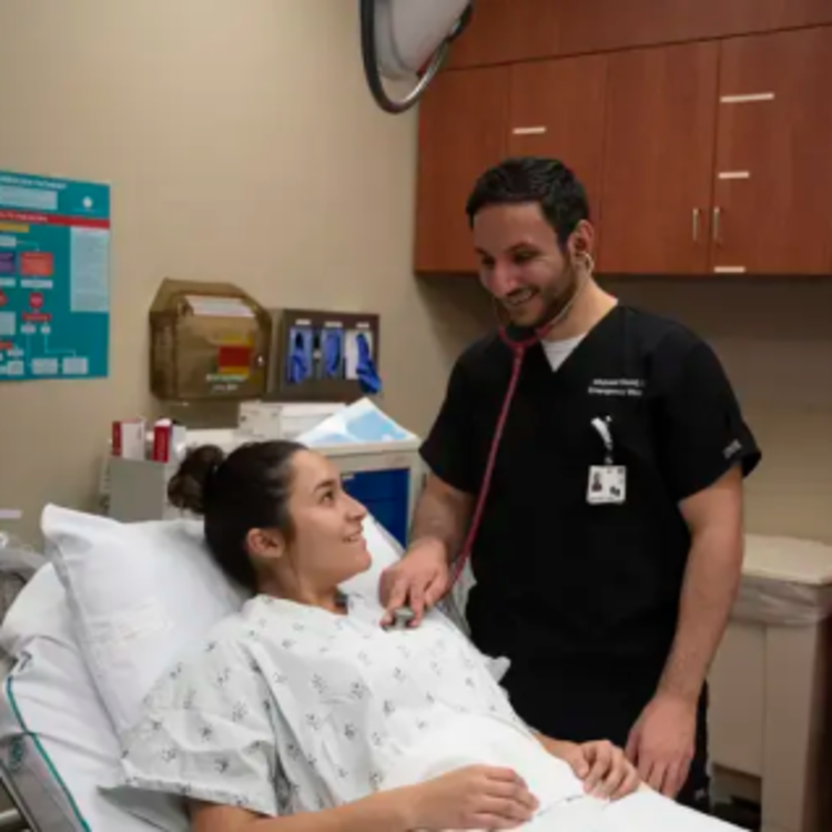 Doctor helping patient