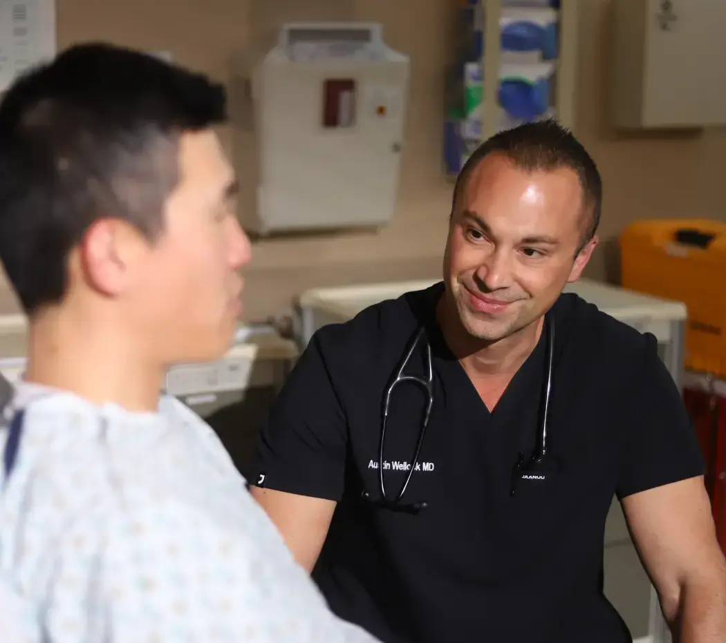 Smiling clinician caring for a patient