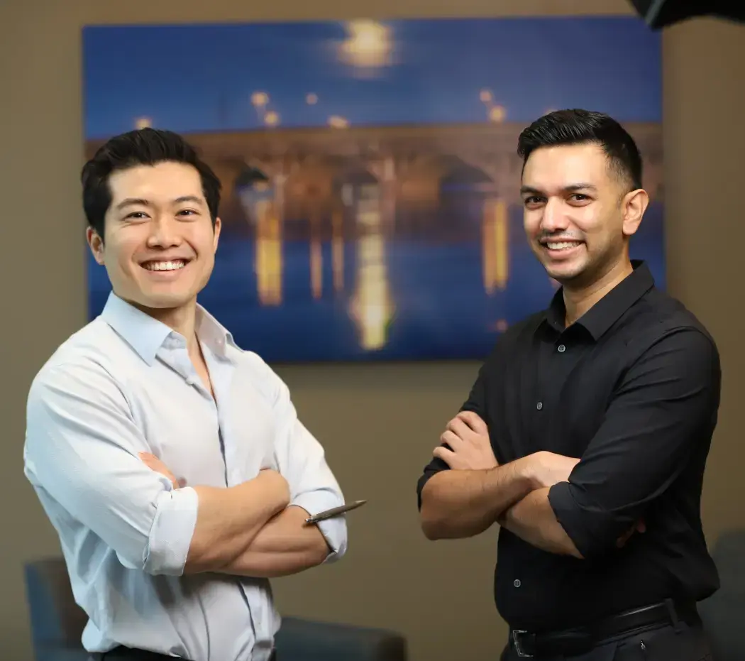 Two USACS professionals smiling