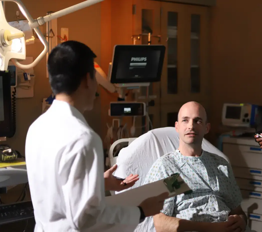 Doctor talking to an emergency care patient