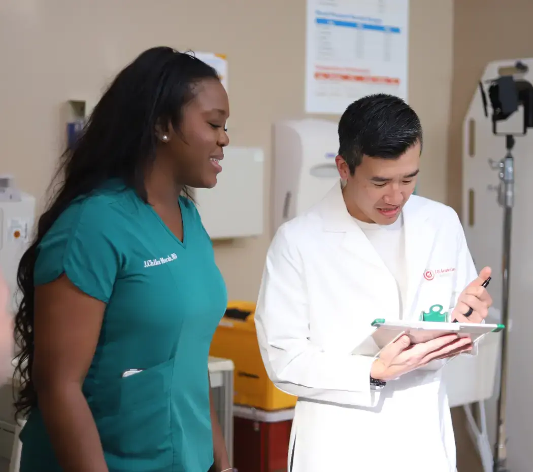 Doctor and nurse discussing diagnosis