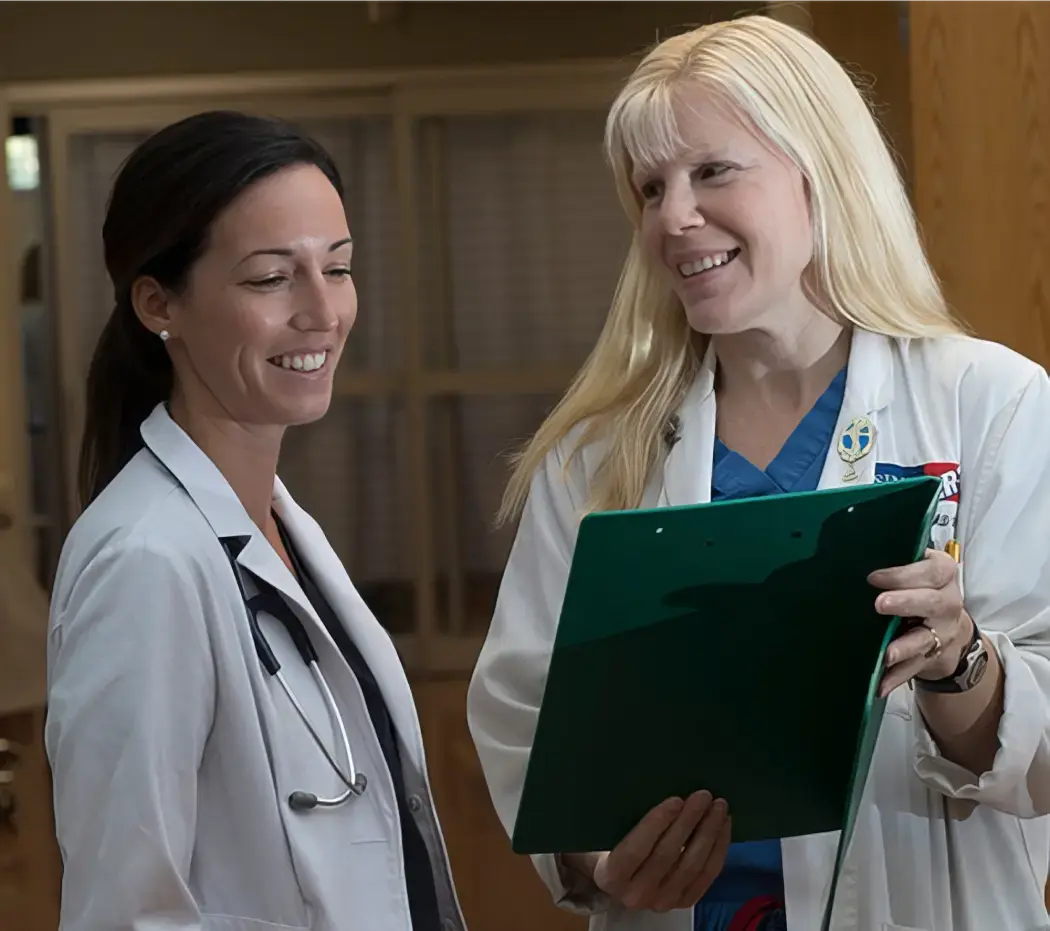 Two doctors showing a chart