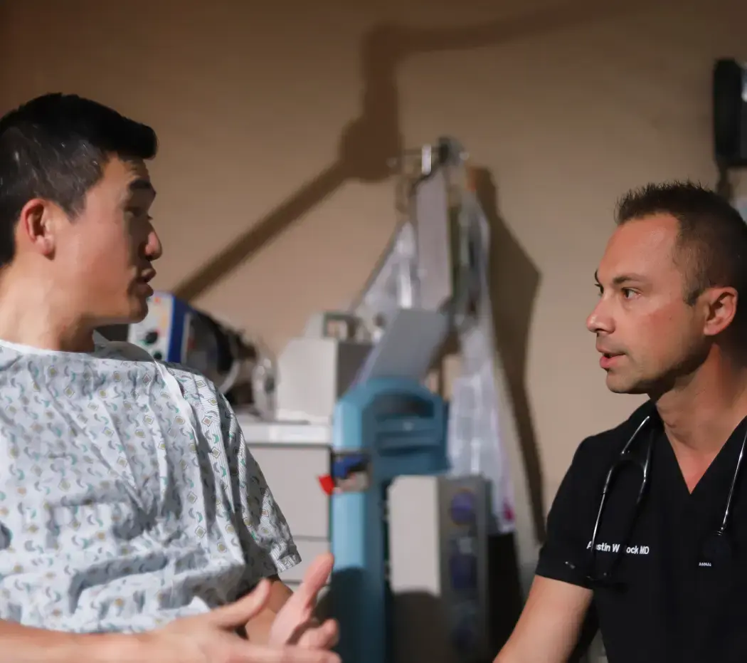 Clinical professional talking to a patient
