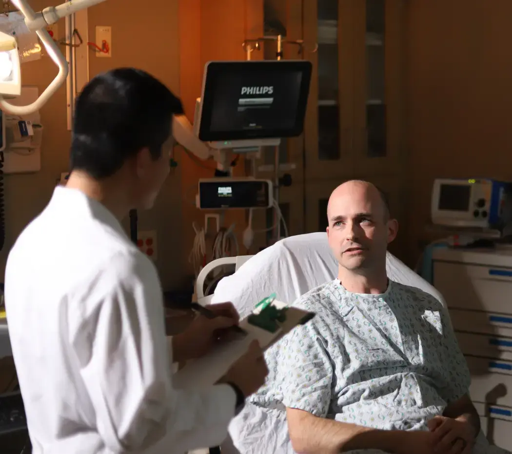 Doctor with patient, in a closed personal unit