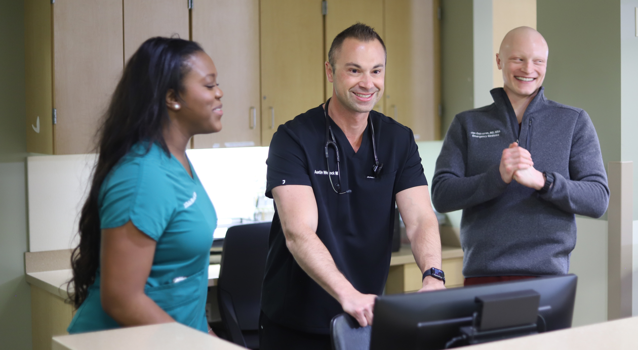 3 Smiling Clinicians
